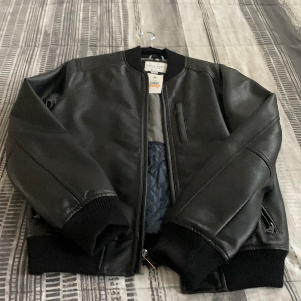 Come Haan jacket. New with tags. Excellent condition. Perfect for the holidays.